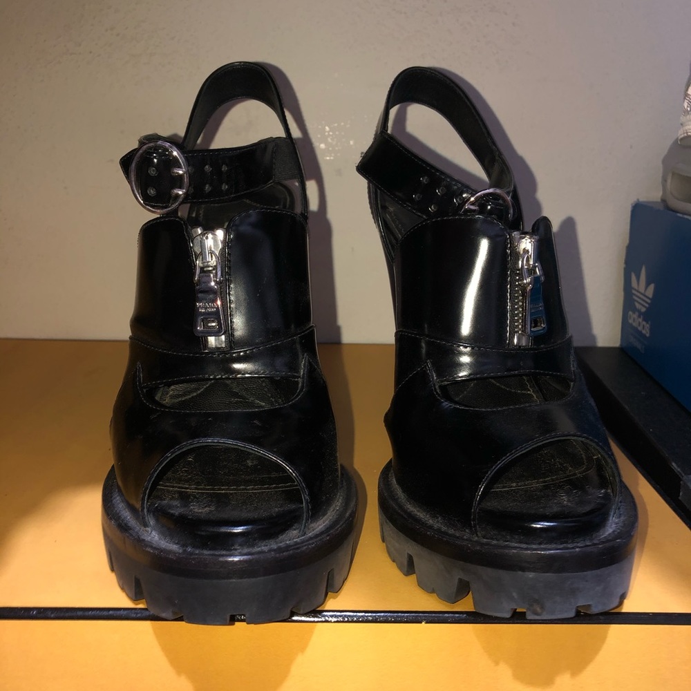 Black lug soles Prada sandals
